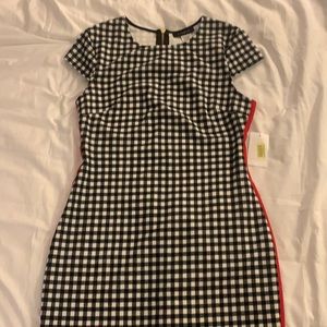 Black & White checkered dress with red stripe on each side. Brand new with tags.